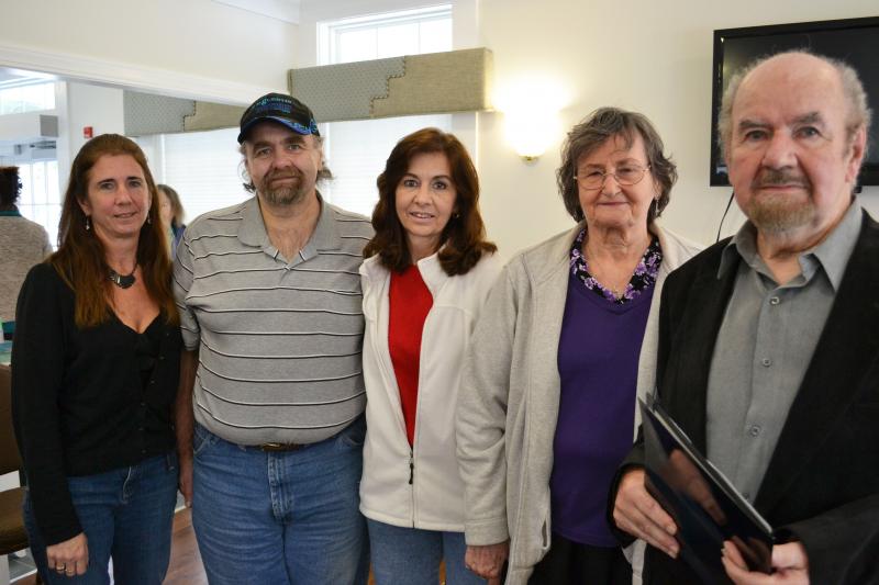 Marion author Charles Chiodi, far right, chronicles his family's escape from communist Hungary to America in his book, "There is Always Sunshine Behind the Clouds." Chiodi is pictured with his family including daughter Gina Sprague, left, son Charles Chiodi, Jr., daughter Letty Erwin and wife Violetta. BY JENNIFER HESHION