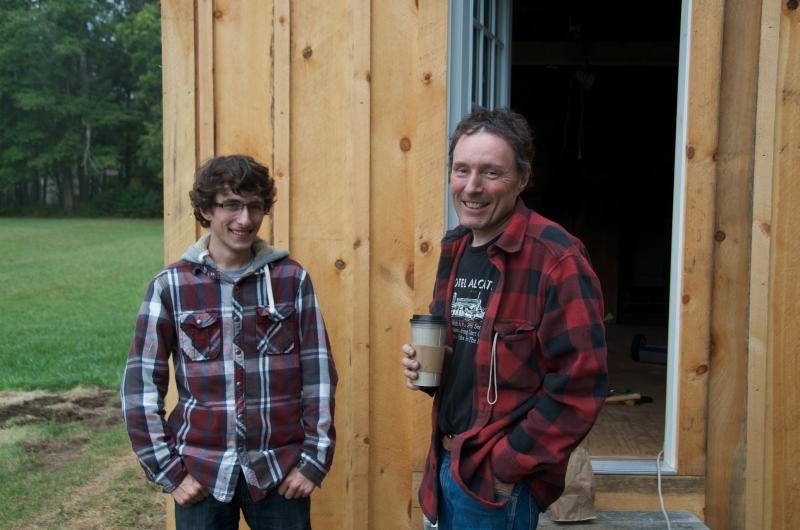 Joe Duggan, right, and his son Dan observe keep watch as the kitchen is demolished. BY GEORGIA SPARLING