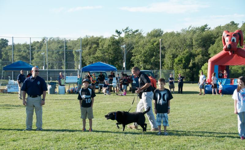 Assistant Deputy Superintendent of K9s for Plymouth County Sheriff Department Kenneth Ballinger demonstrated how their dogs can detect drugs and find people. BY GEORGIA SPARLING
