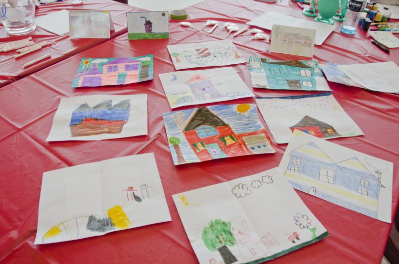 Kids drew their dream houses for the annual coloring contest. Winners will have their drawings made into greeting cards that Habitat will use sell as a fundraiser. BY GEORGIA SPARLING