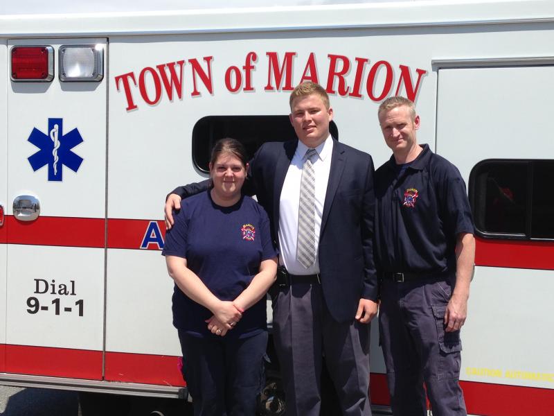 Adam Fraley, center, stands with Amy Sylvia and Matt VanDusen of the Marion Fire/EMS Department. COURTESY ADAM FRALEY