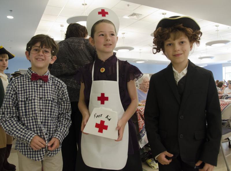 From left: Jonnie Ciffolillo as Norman Rockewell, Jillian LeBlanc as Clara Burton and Robert Morgan as John Adams. BY GEORGIA SPARLING