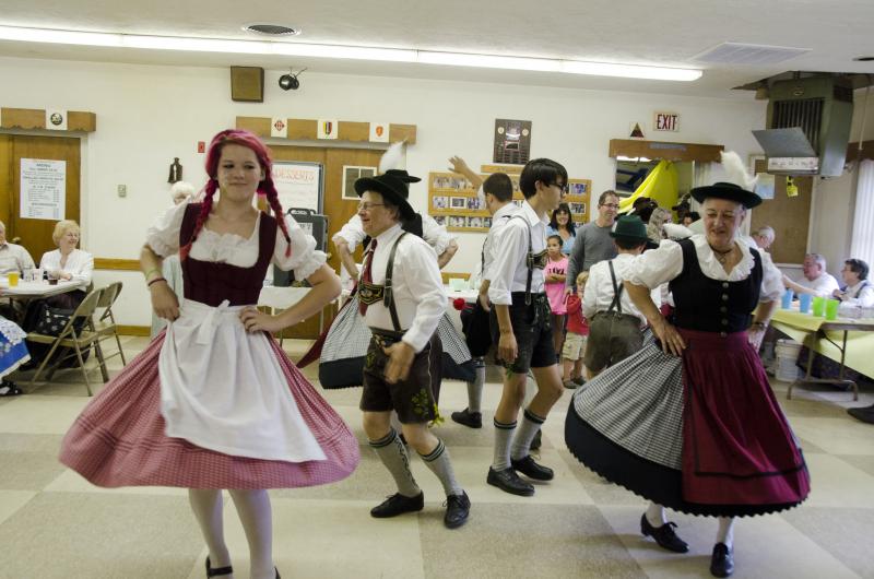 The Alpenblumen Bavarian Folk Dancers take a twirl. The Pawtucket based group has their own Oktoberfest planned for the end of the month. BY GEORGIA SPARLING