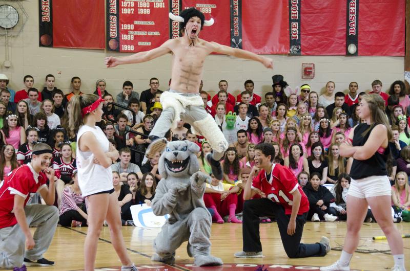 Will Hopkins jumps over the bulldog as "The Chronicles of Narnia" character Mr. Tumnus in the sophomore skit. BY GEORGIA SPARLING