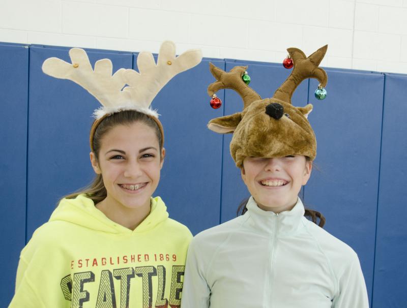 Cami Parker and Mia Costa, Mitchell's classmates, got in the spirit of the season and of giving on Friday. BY GEORGIA SPARLING