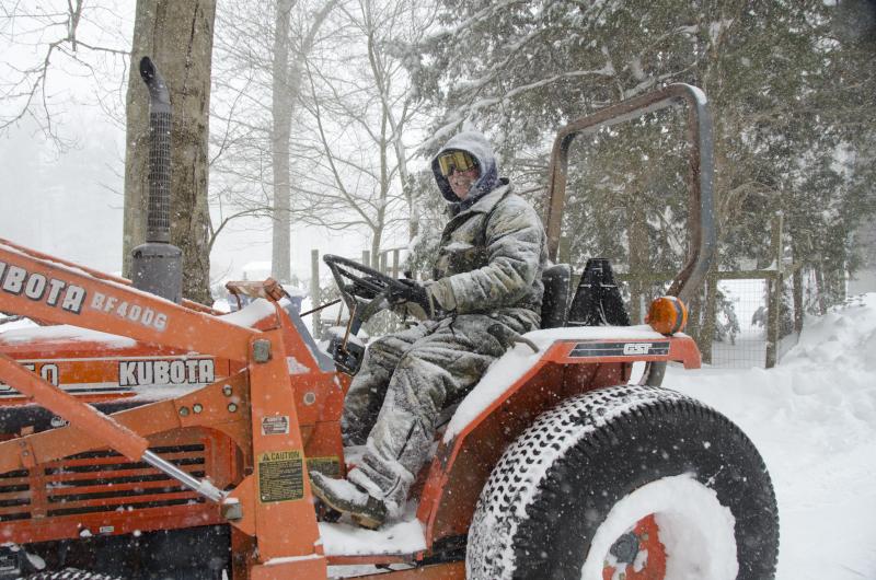 Rochester resident Tom Nelson gets a jump start on plowing Tuesday afternoon. BY GEORGIA SPARLING