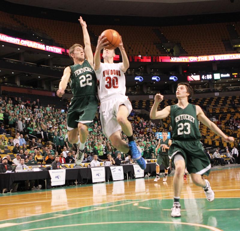ORR senior guard Ryan Beatty flies toward the hoop during the Bulldog's 63-49 win at the TD Garden Tuesday. BY NICK WALECKA