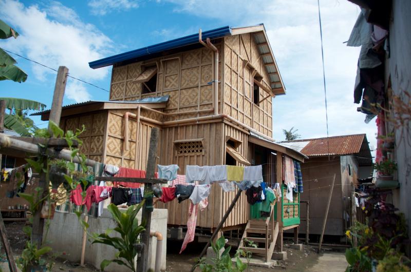 One of 40 homes in the 83-C neighborhood built by All Hands Volunteers. Volunteers dug foundations, poured concrete and built typhoon resistant houses for local families in need. BY GEORGIA SPARLING