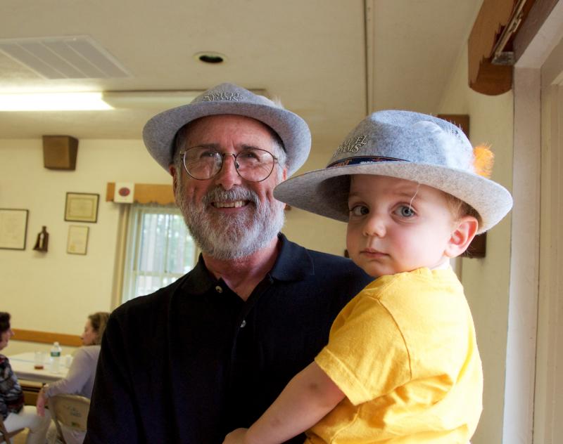 John McLaughlin and his grandson Peter brought their German hats to the celebration. BY GEORGIA SPARLING