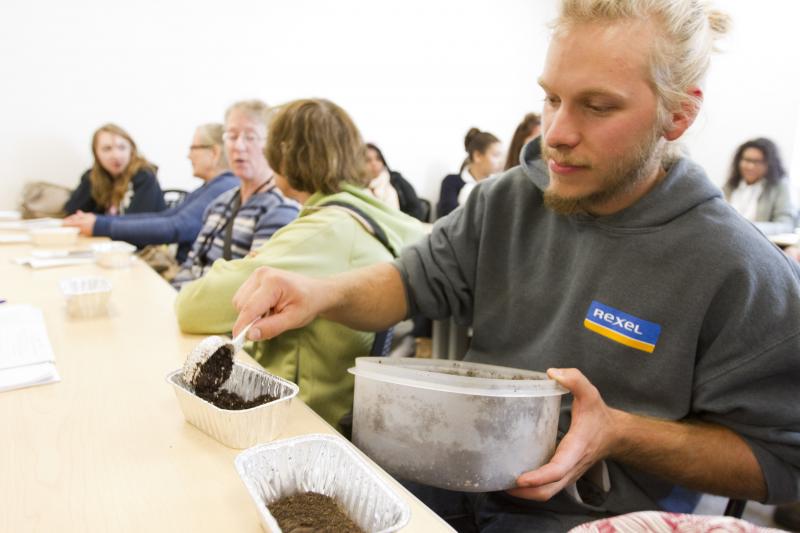 Rochester's Steven Rittenhouse prepares a small indoor garden at Connecting for Change workshop. BY GEORGIA SPARLING