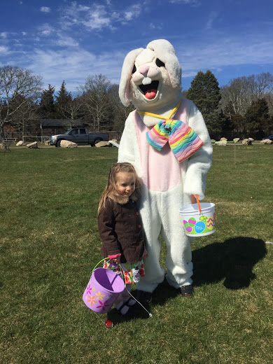 4-year-old Tallulah Lovegrove of Marion celebrates her fourth birthday at the Ned's Point Easter Egg Hunt. BY SARA LAFRANCE