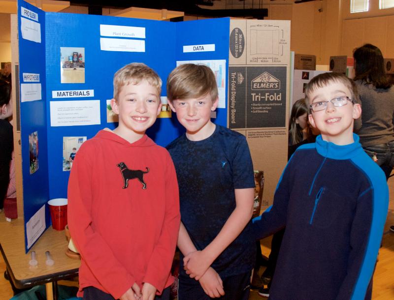 Jaymison Gunschel, Jacob Hadley and Alex Fox found that water is better for plants than pineapple juice, V8, coffee and cow blood. BY GEORGIA SPARLING