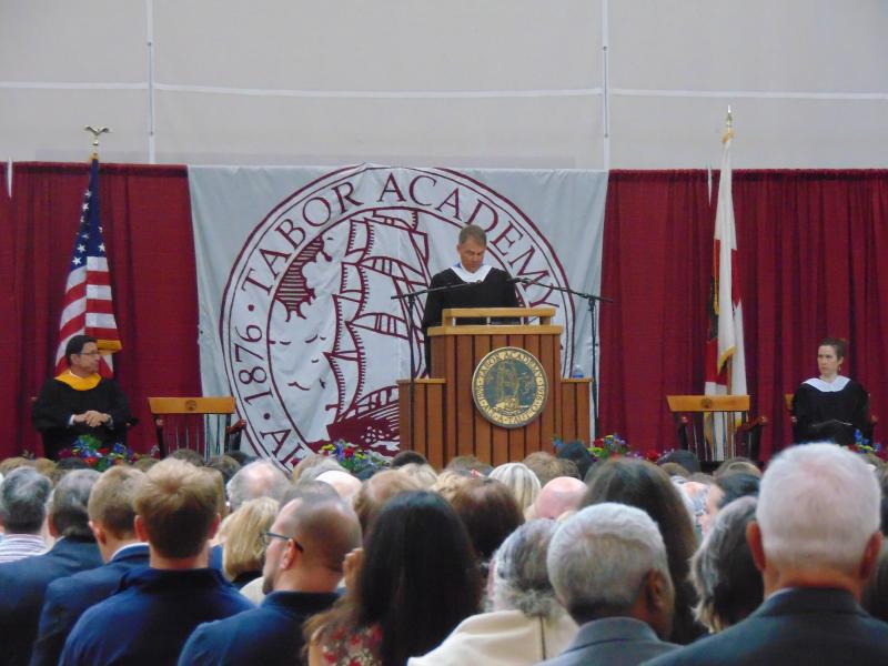 Head of school John Quirk delivers the opening remarks and introduces the senior speakers. BY TANNER HARDING