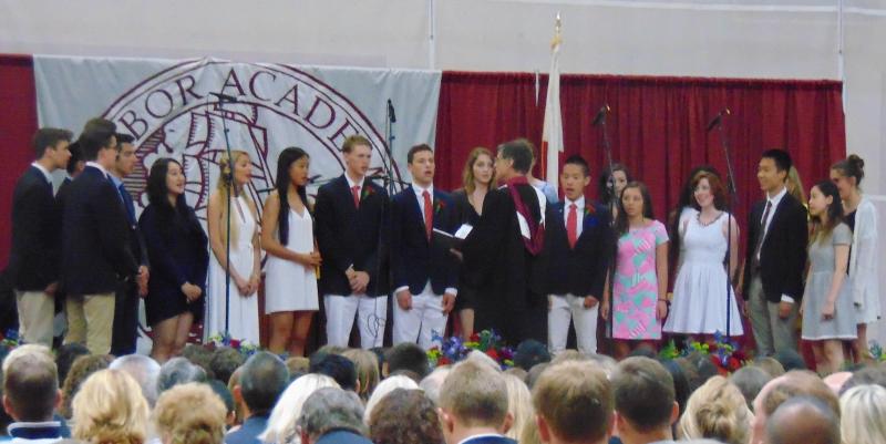 The Madrigal Singers from Tabor sing the Tabor Academy Alma Mater and a rendition of Billy Joel's "And So It Goes." BY TANNER HARDING