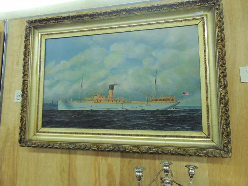 Painting by Antonio Jacobsen of a steamship. The frame is an original, and it was estimated to go for $5,000 to $10,000. It sold for about $8,000. BY TANNER HARDING
