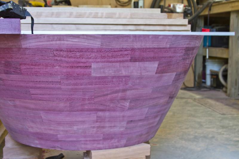 Each piece uses a different type of wood, including this eggplant-hued purpleheart. BY GEORGIA SPARLING