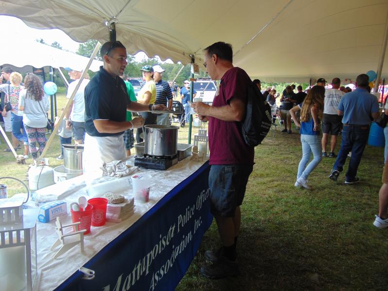 Paul Andrews of the Mattapoisett Police Department said he kept his chowder classic. "I use butter, clams...you get a lot of people who ruin it and then it's not clam chowder if you ask me." BY TANNER HARDING