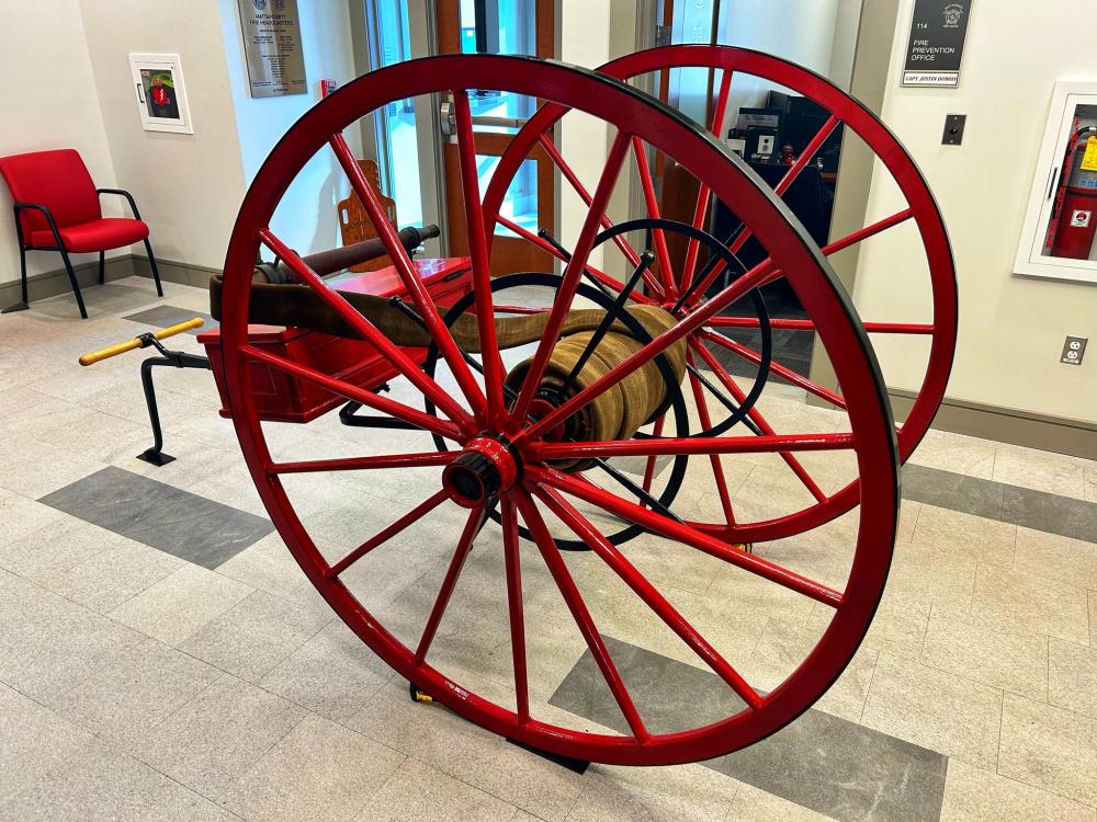 19th century hose cart now on display at Mattapoisett Fire station