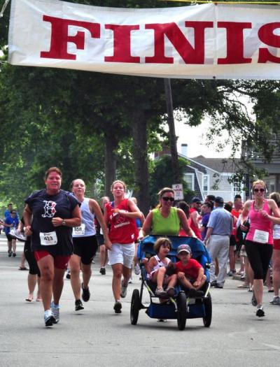 The 41st Annual Mattapoisett Road Race kicked off on July 4 with over 1039 runners. The road race is a 5-mile course around the town of Mattapoisett and raises money for athletes at Old Rochester Regional High School. BY MATT CAMARA