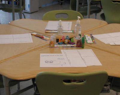 Triangular desks are designed to promote small-group sharing and cooperation -- as they are moved around into a variety of configurations. BY ANNE EISENMENGER