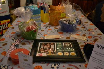 Guests of the fundraiser could purchase raffle tickets for several mystery bags. BY JENNIFER HESHION
