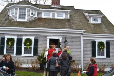 This tour group makes it's way inside the home located at 12 Main St., which was built in 1820. BY JENNIFER HESHION