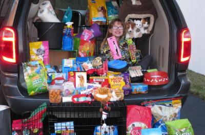 Eight-year-old Mia Oliveira collected nearly 400 items for the animal shelters. COURTESY TARA OLIVEIRA