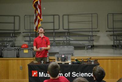 Using a capacitor, Andy Hall launches an aluminum ring to the ceiling of the gym. BY JENNIFER HESHION