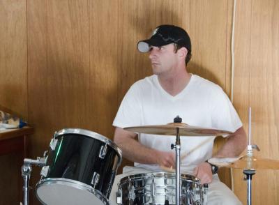 Drummer Morgan Douglas takes the ferry from Martha's Vineyard each week to practice with the band. BY GEORGIA SPARLING