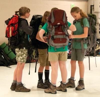Students are instructed to exercise with their packs and boots to prepare for hiking in the woods. BY GEORGIA SPARLING