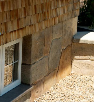 Randall Eglin said she wasn't thrilled about the concrete on the exterior of Foss Farm, but learned to make it look like stone and tile. BY GEORGIA SPARLING