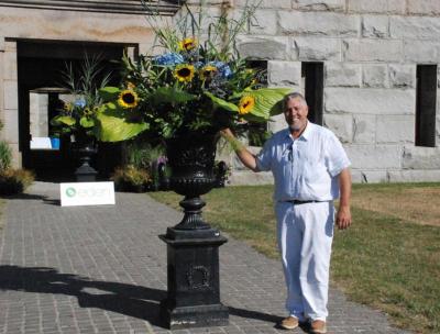 Steve Gonsalves, owner of Eden's Florist and Garden Shop in Marion, donated many of the floral decorations for the party. COURTESY RICHARD GORMLEY