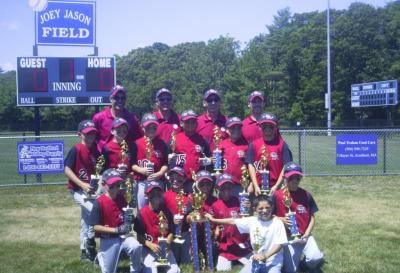 The age nine and under team. Front: Hayden Duke, Elliot Gurney, Chris Gauvin, Sam Parks, Alex Wright, Will Stark, and bat boy: Derek Gauvin. Center: Ryan Quinlan, Tommy Durocher, Steven Carvalho Jr., Wayne Andrews, Danny Flynn, and Jaggar Jones. Back: Coaches Steve Carvalho, Dave Wright, Bill Stark, and Arthur Parks. COURTESY CAROL CARVALHO