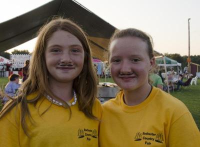 After the Frog Derby, Kaylee Glidden, left, got fake mustache tattoos with a friend. BY GEORGIA SPARLING