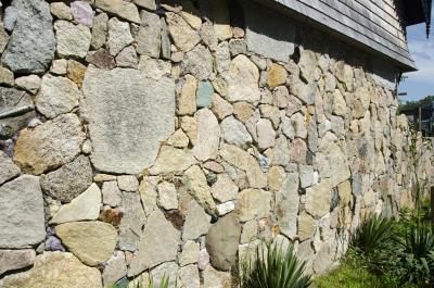 Dexter's walls are a work in progress as each newly cemented piece requires one week to dry before another stone can be placed on it. BY GEORGIA SPARLING