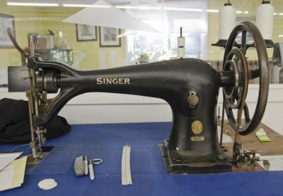 Although technology has advanced a lot in the last 15 years, the company still uses several antique sewing machines such as this 1905 Singer. BY GEORGIA SPARLING