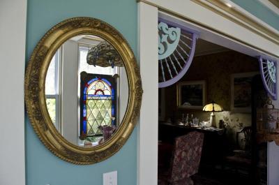 Gold, blue and purple are the colors of choice throughout the inside and outside of the Rocha's home. BY GEORGIA SPARLING