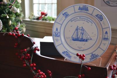 In honor of the tavern's bicentennial, the Woman's Club is selling commemorative plates of Marion that feature scenes of Tabor Boy, Handy’s Tavern, The First Congregational Church of Marion, Beverly Yacht Club, Marion Town Hall, the Elizabeth Taber Library, The Music Hall, and Bird Island. BY JENNIFER HESHION