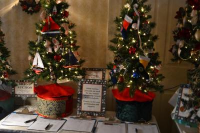 The Woman's Club held a Christmas tree raffle during the tour. All proceeds will go toward scholarships for local students. BY JENNIFER HESHION
