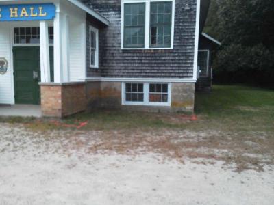 Another before photo of the Grange shows the dirt driveway which has since gotten 26 yards of gravel. COURTESY BEN FERREIRA