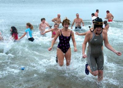 It didn't take long to get back out of the freezing water and into the heated tent. BY GEORGIA SPARLING