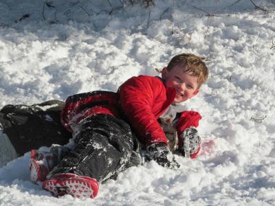 Brady Egan and his family enjoyed some time in the snow on Sunday while they waited on power to be restored to their home in Rochester. COURTESY SCOTT EGAN