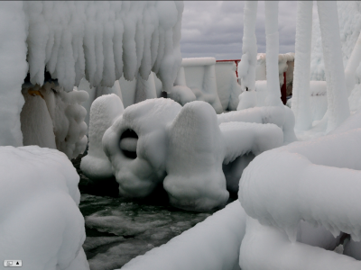 The bow of the ships can get covered in ice during the four-day voyage from Chile. The ice has to be removed with a crow-bar to prevent the ship from losing balance. COURTESY ALAN HICKEY