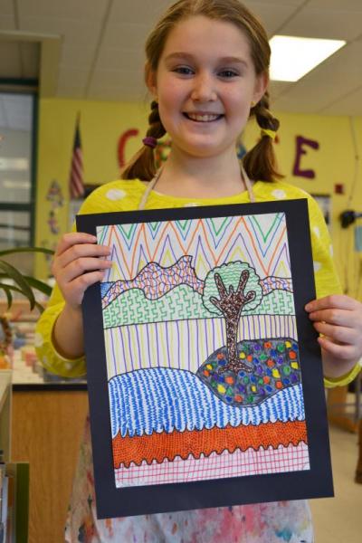 Fourth-grader Caroline Owens also did a landscape, for which she drew inspiration from art books and slides. "I got some ideas from those and then I created my own things. I used dots, lines, and zig-zags. I designed the patterns." BY JENNIFER HESHION