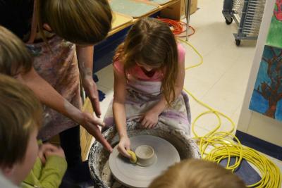 Kids made a beeline to the pottery wheel for a shot to create a work of their own. BY JENNIFER HESHION