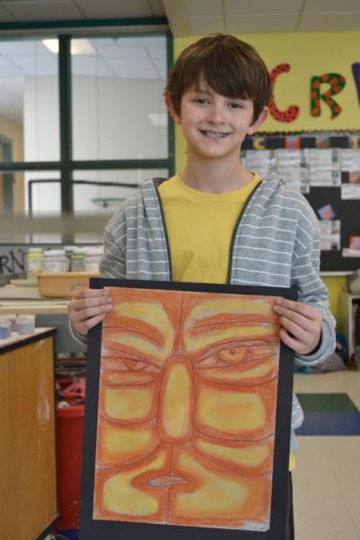 Fourth-grader Jacob Spark's "angry face" will be on display at the Art Center. Spark chose the subject of his assignment, but don't get the wrong idea. He chose an "angry face" because he had a color scheme in mind. "I chose angry because I thought I could represent it really well. I used yellow, orange, and red to represent angry." BY JENNIFER HESHION