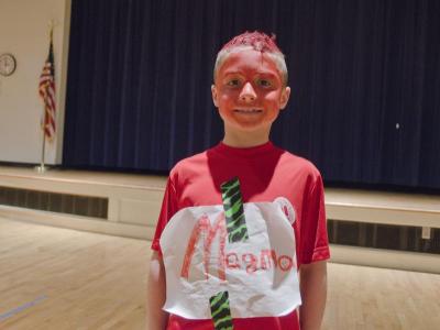 Dressed in red from head to toe, fourth grader Sam Parks was dressed at magma. Sam said the term for hot fluid beneath the earth's surface was a vocabulary word from a unit on rocks and minerals. BY GEORGIA SPARLING
