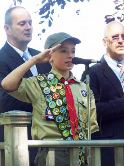Jack Gordon, Boy Scout Troop 32's Senior Patrol Leader, recites the Pledge of Allegiance in front of Marion's Town House. BY MATTHEW BERNAT