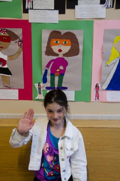 Holyn Turner, a third grade student, displayed her superhero whose powers include shooting bees at bad guys. BY GEORGIA SPARLING