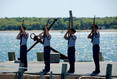 Members of the New Bedford Junior ROTC gave the salute at the Town Wharf and at Cushing Cemetery. BY GEORGIA SPARLING
